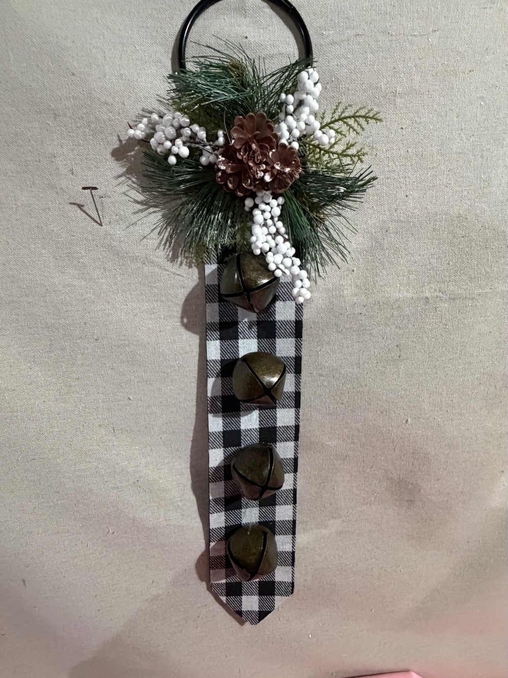 Black Buffalo Check Jingle Bell Door Hanger with Pine & Berries